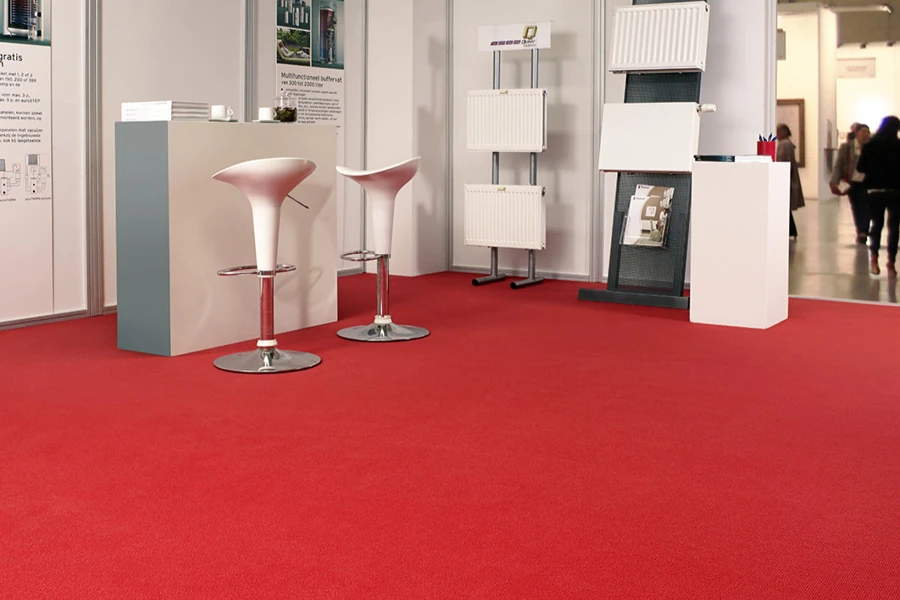 Vibrant red exhibition carpet in trade booth