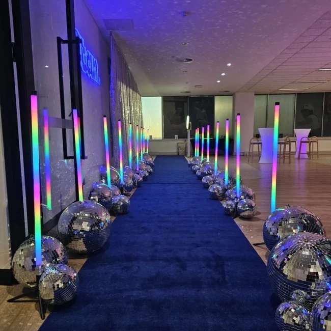 Blue exhibition carpet runner lined with lights