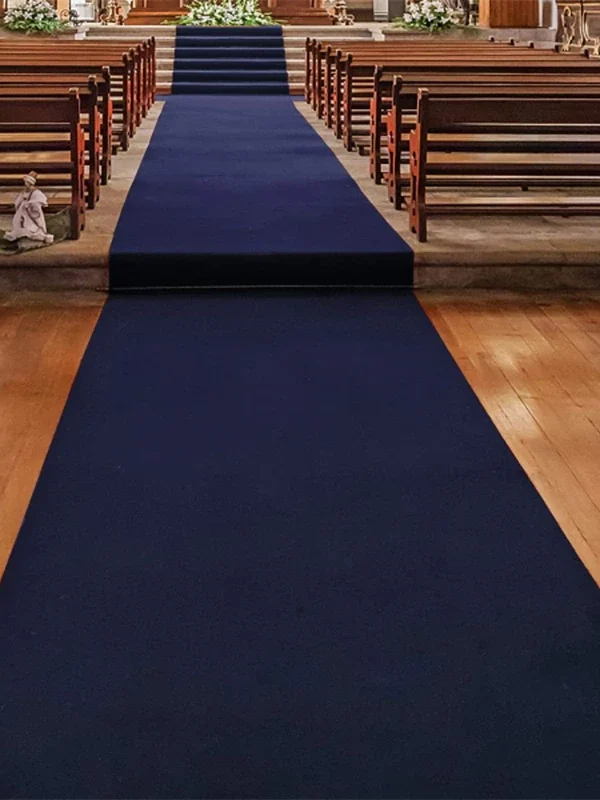 Dark blue exhibition carpet in church aisle
