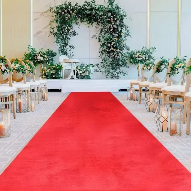 Red carpet runner with floral arch