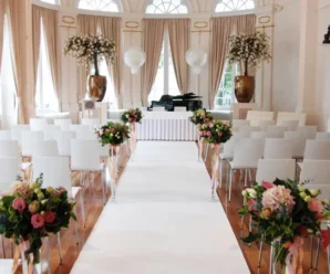 White-event-carpet-aisle-runner-setup.webp